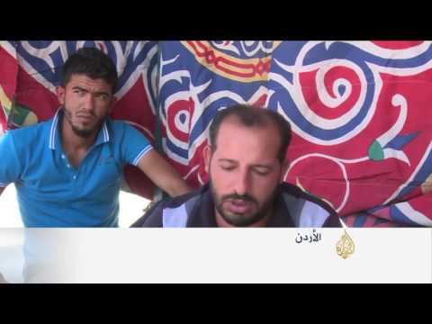 شاهد السلطات الأردنية تفض اعتصاما لعاطلين عن العمل