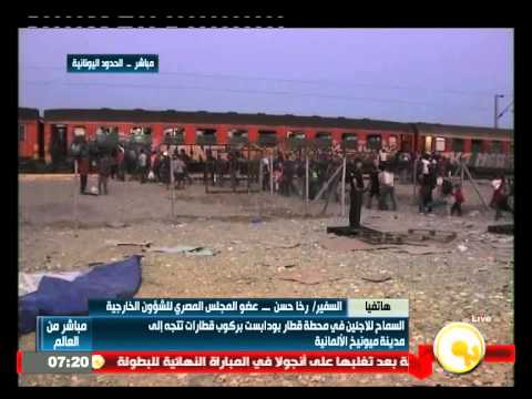 شاهد السماح للاجئين بركوب قطارات تتجه إلى مدينة زيورخ الألمانية