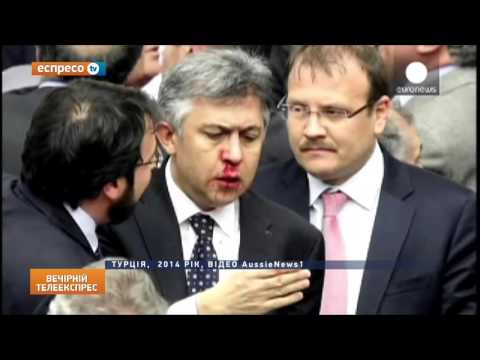 شاهد تراشق بالعبوات الزجاجية في البرلمان الأوكراني