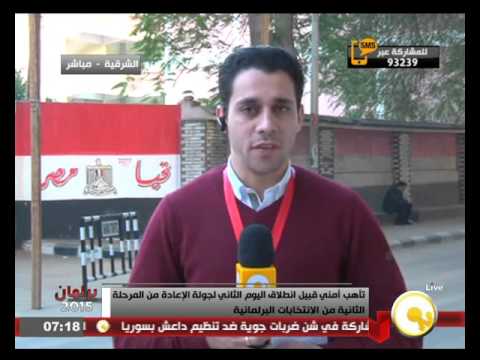 شاهد موظف يسود بعض البطاقات الانتخابية لصالح أحد المرشحين